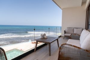 Relaxing ocean view from a balcony at Mundaca Real Estate property in Mexico.