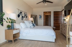 Relaxing bedroom with modern decor and natural light, ideal for luxury real estate in Mundaca.