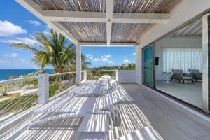 Relaxing ocean view from a modern balcony at Mundaca Real Estate property in Mexico. Isla Mujeres Mexico Property