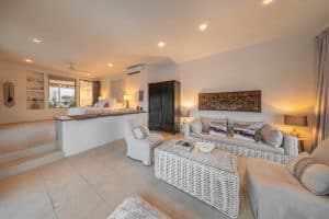 Modern living room with comfortable seating and stylish decor in a beachfront property. Isla Mujeres Mexico Property