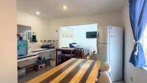 Bright kitchen and living area in a modern Mexican home with open layout and natural light. Isla Mujeres Mexico Property