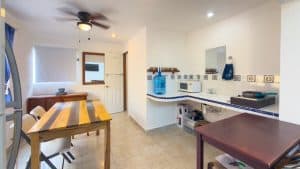 A comfortable kitchen and dining area in a modern home in Mundaca Real Estate, perfect for family li. Isla Mujeres Mexico Property