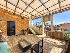 Spacious rooftop terrace with shaded pergola and city views in Merida, Mexico. Isla Mujeres Mexico Property